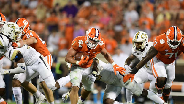 Sep 18, 2021; Clemson, South Carolina, USA; Clemson Tigers running back Will Shipley (1) carries the ball against the Georgia Tech Yellow Jackets during the second half at Memorial Stadium. Mandatory Credit: Adam Hagy-USA TODAY Sports